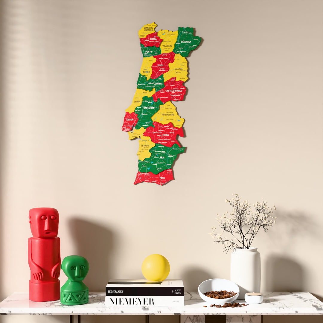 Flag colored Portugal wooden wall map above a marble console, front view