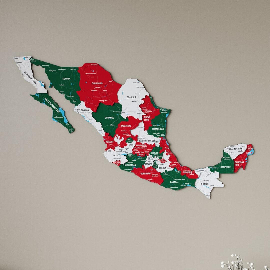Flag color Mexico wooden wall map in green, red and white states on a beige wall, angled view showing the layered pieces