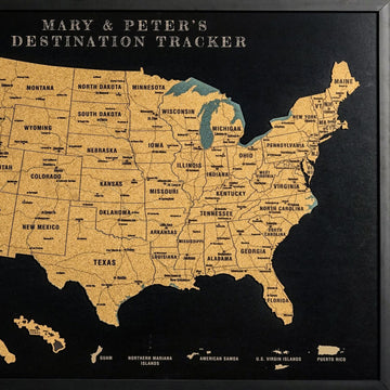 Close-up of the framed cork USA map with a custom title band, state names, Hawaii and U.S. territories