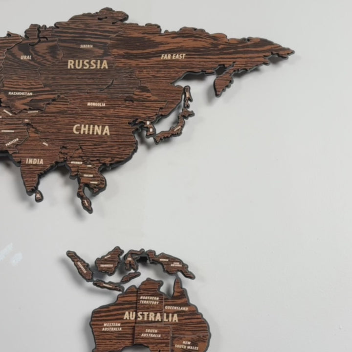 wooden-world-map-wood-on-metal-video-multilayered-wooden-wall-art-dark-brown-unique-geographic-artwork-colorfullworlds
