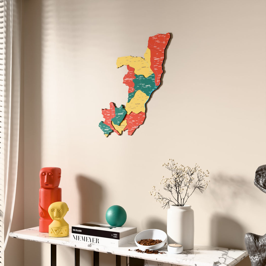 Flag colored Republic of the Congo wooden wall map beside a sheer curtain, angled view