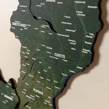 Close-up of the Satellite Republic of the Congo wooden wall map with layered regions and printed names