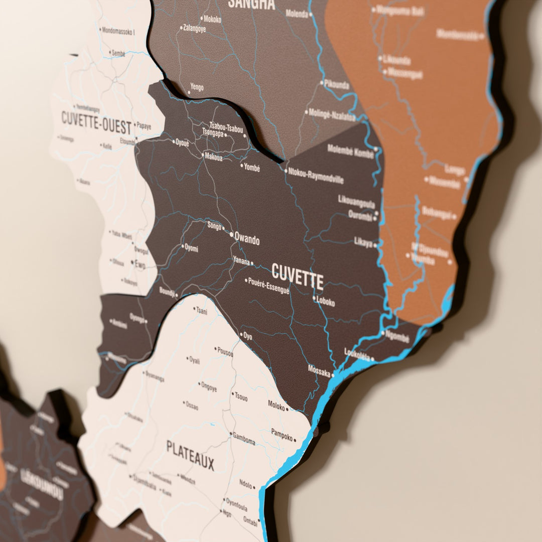 Close-up of the Soil Republic of the Congo wooden wall map with layered regions and printed names