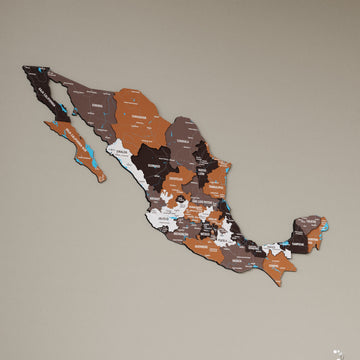 Soil Mexico wooden wall map in brown, rust and cream states on a beige wall, angled view showing the layered pieces
