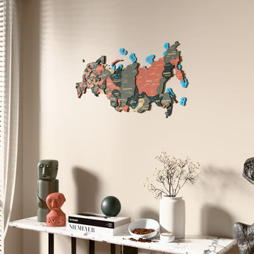 Sage Russia wooden wall map beside a sheer curtain, angled view