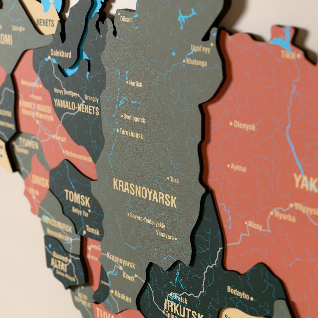 Close-up of the Sage Russia wooden wall map with layered regions and printed names