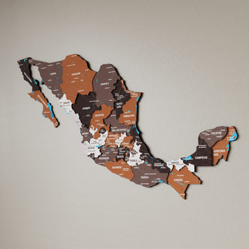 Soil Mexico wooden wall map in brown, rust and cream states on a beige wall, angled view showing the layered pieces