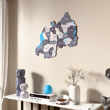 Nimbus Rwanda wooden wall map beside a sheer curtain, angled view