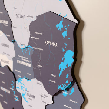 Close-up of the Nimbus Rwanda wooden wall map with layered regions and printed names
