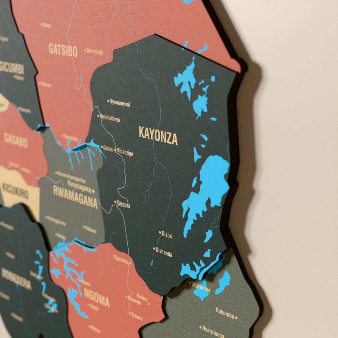 Close-up of the Sage Rwanda wooden wall map with layered regions and printed names