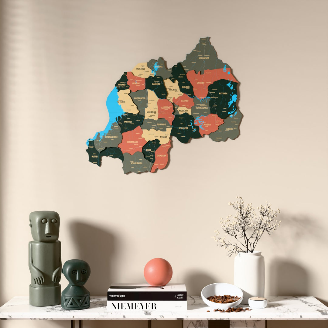 Sage Rwanda wooden wall map above a marble console, front view