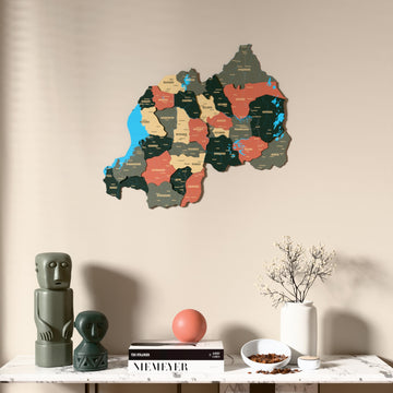 Sage Rwanda wooden wall map above a marble console, front view