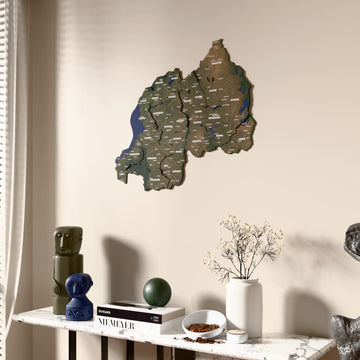 Satellite Rwanda wooden wall map beside a sheer curtain, angled view