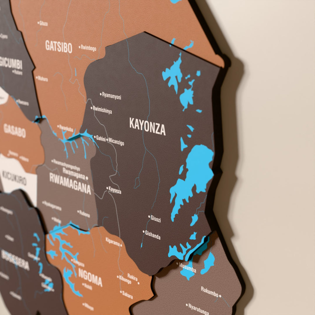 Close-up of the Soil Rwanda wooden wall map with layered regions and printed names
