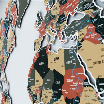 Close-up of Africa and the Middle East on the sage metal world map, with Algeria, Libya, Egypt and Sudan