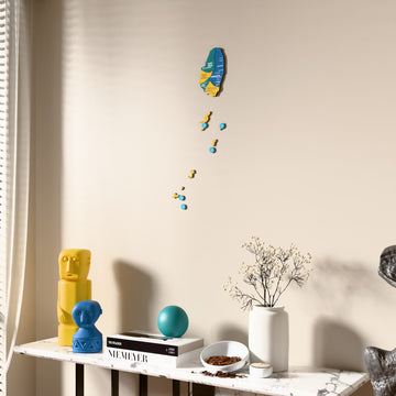 Flag colored Saint Vincent and the Grenadines wooden wall map beside a sheer curtain, angled view