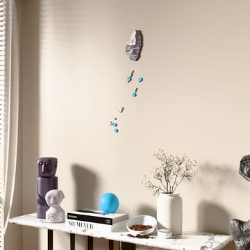 Nimbus Saint Vincent and the Grenadines wooden wall map beside a sheer curtain, angled view