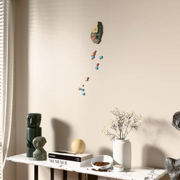 Sage Saint Vincent and the Grenadines wooden wall map beside a sheer curtain, angled view