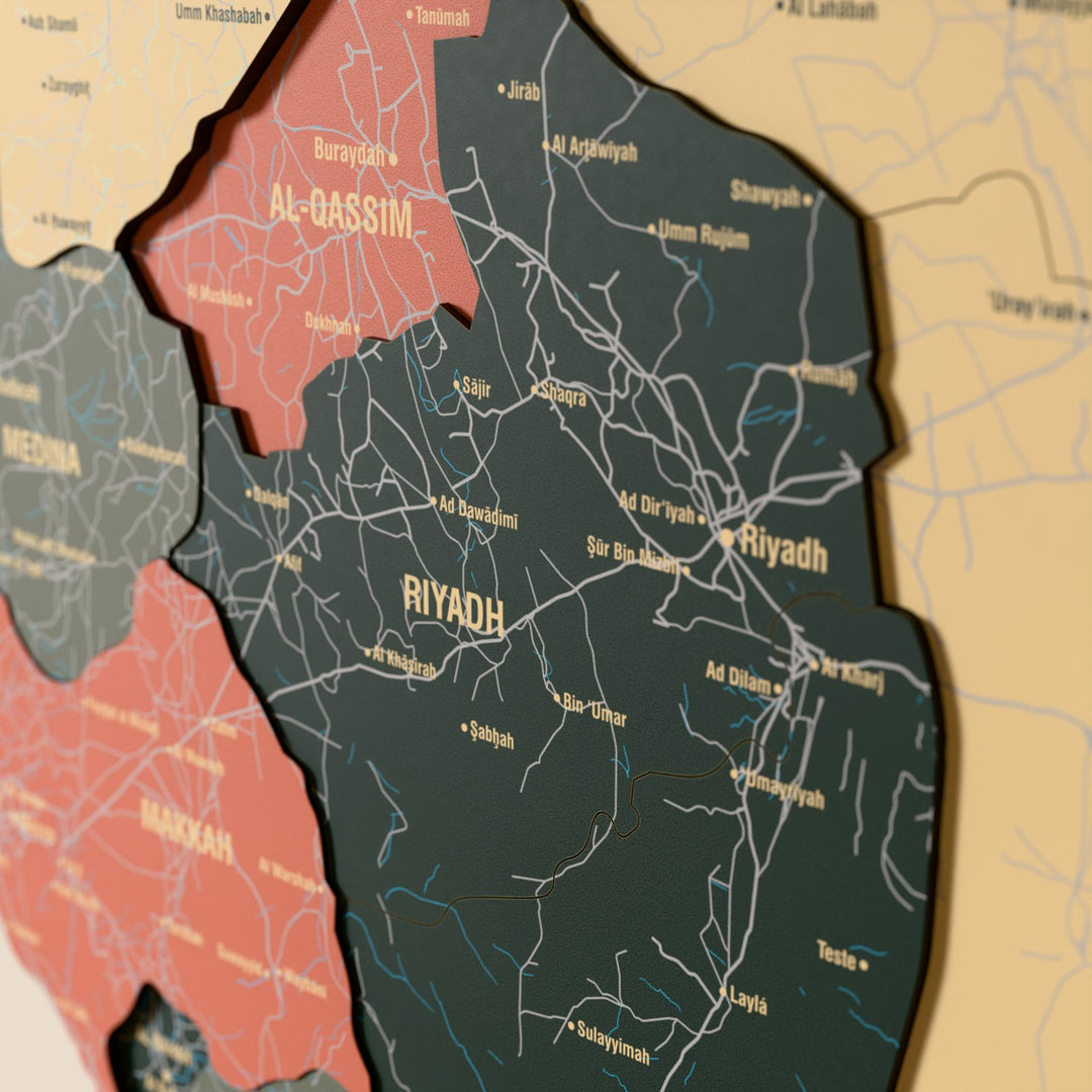 Close-up of the Sage Saudi Arabia wooden wall map with layered regions and printed names