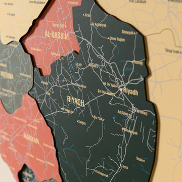 Close-up of the Sage Saudi Arabia wooden wall map with layered regions and printed names