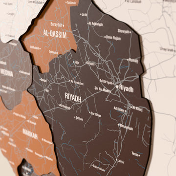 Close-up of the Soil Saudi Arabia wooden wall map with layered regions and printed names