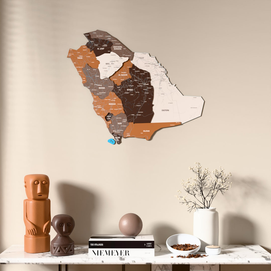 Soil Saudi Arabia wooden wall map above a marble console, front view
