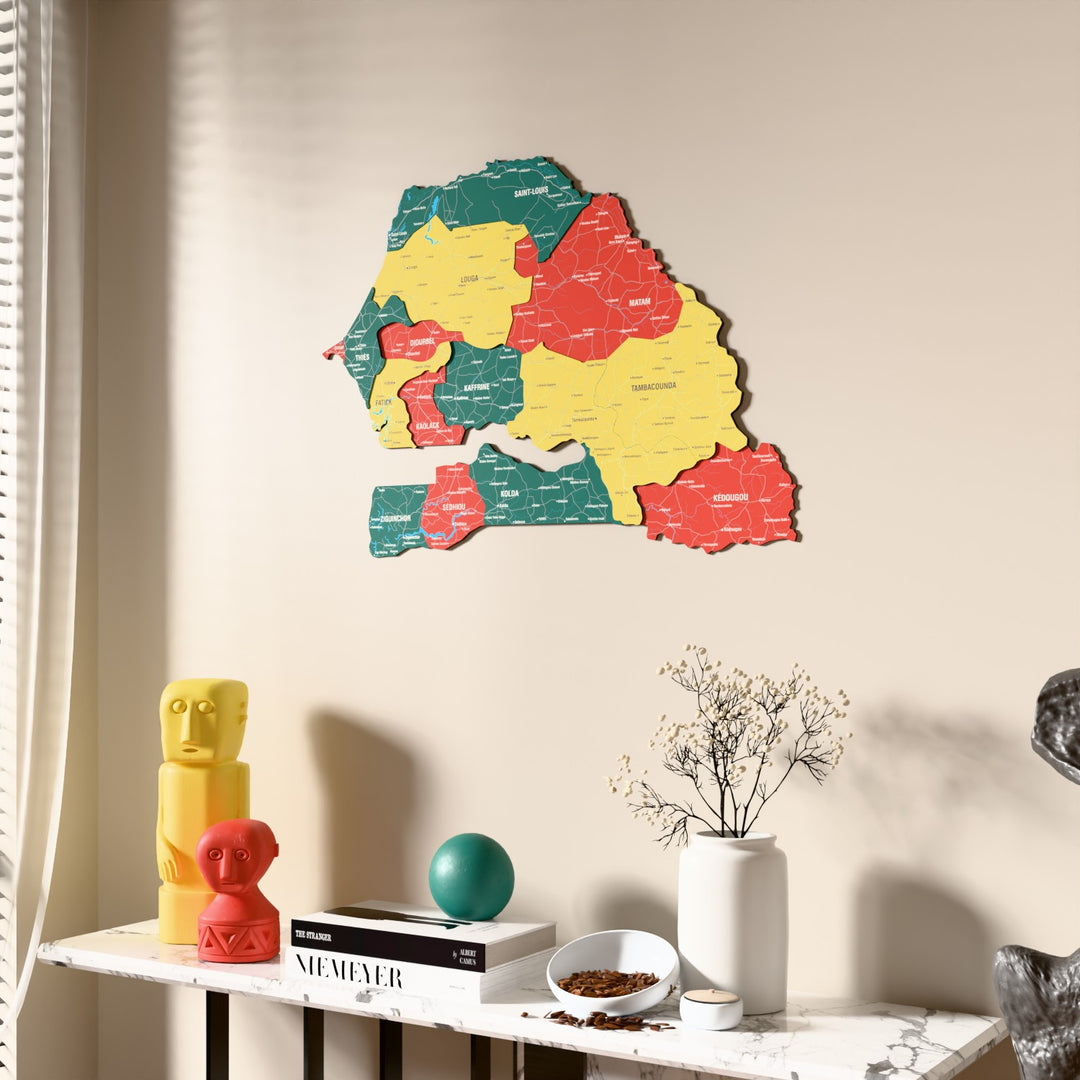Flag colored Senegal wooden wall map beside a sheer curtain, angled view