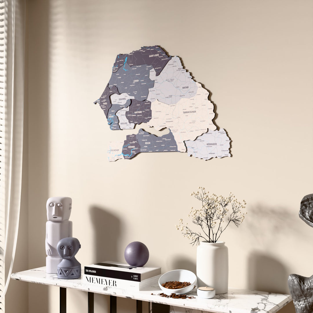 Nimbus Senegal wooden wall map beside a sheer curtain, angled view