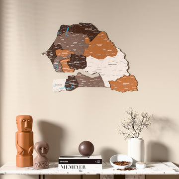Soil Senegal wooden wall map above a marble console, front view