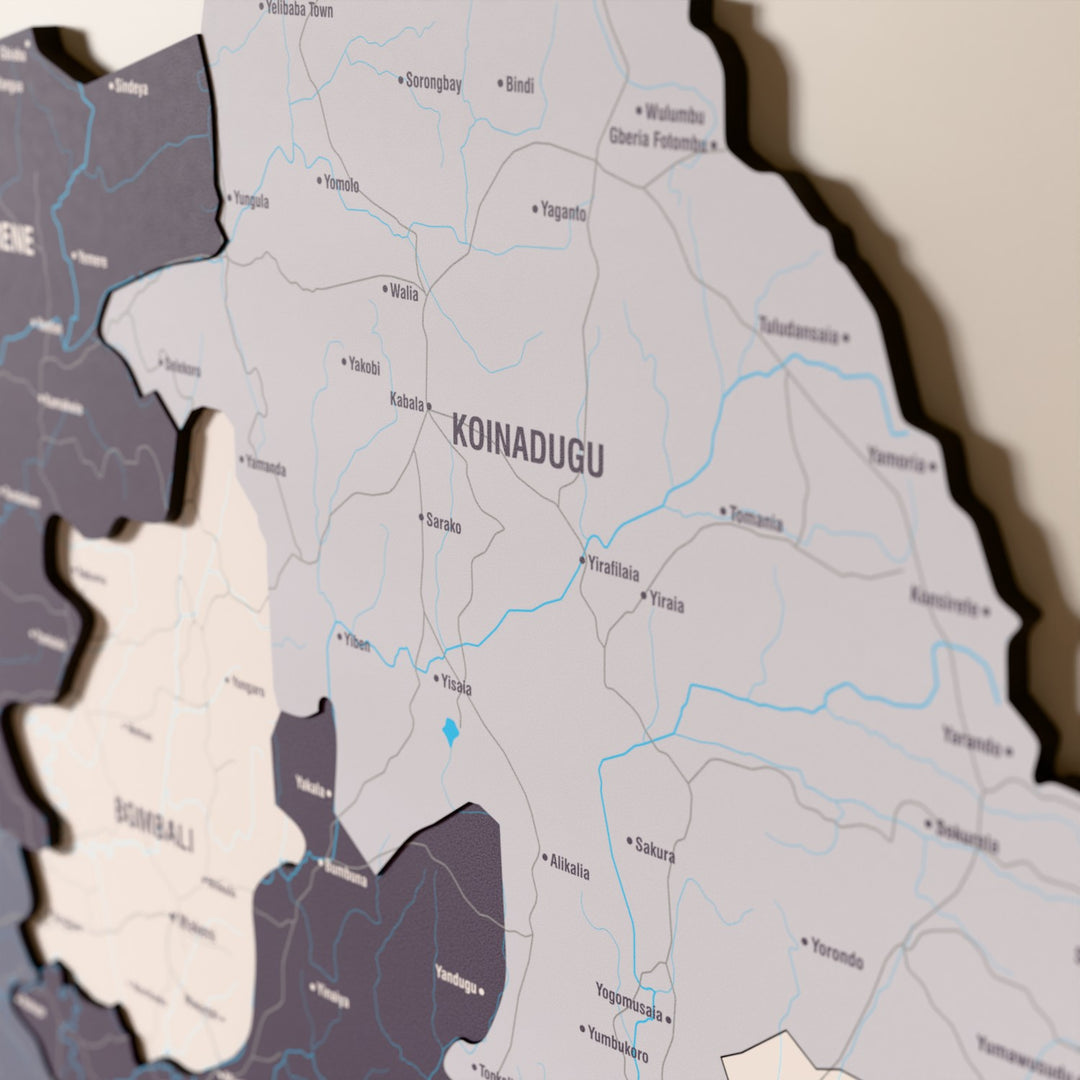 Close-up of the Nimbus Sierra Leone wooden wall map with layered regions and printed names