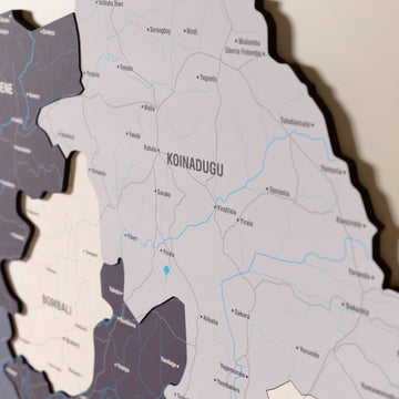 Close-up of the Nimbus Sierra Leone wooden wall map with layered regions and printed names