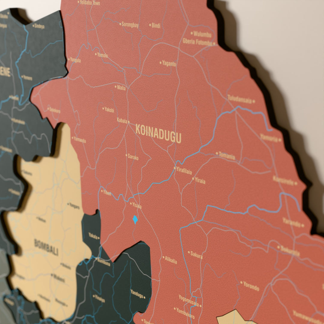 Close-up of the Sage Sierra Leone wooden wall map with layered regions and printed names