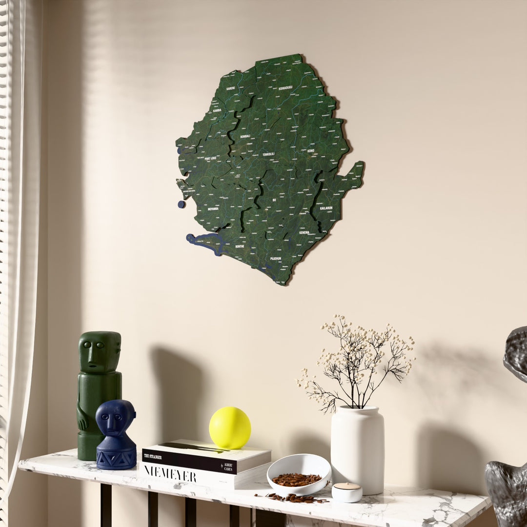 Satellite Sierra Leone wooden wall map beside a sheer curtain, angled view