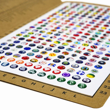 276-piece silicone pin sheet full of flag and activity icons, coordinate letters along the bottom edge