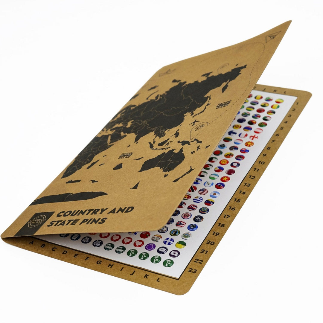276 silicone pin set with the kraft cover half open, side view of the rows of flag pins