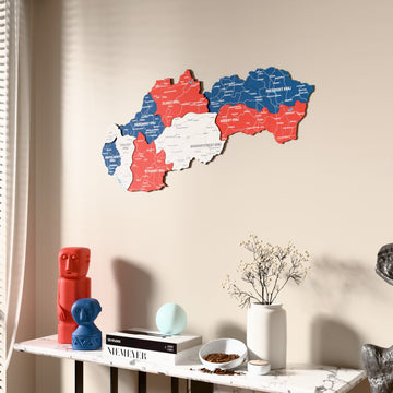 Flag colored Slovakia wooden wall map beside a sheer curtain, angled view