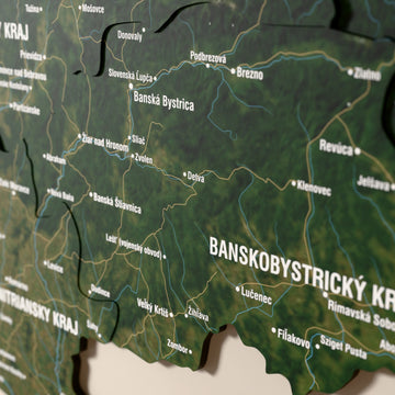 Close-up of the Satellite Slovakia wooden wall map with layered regions and printed names