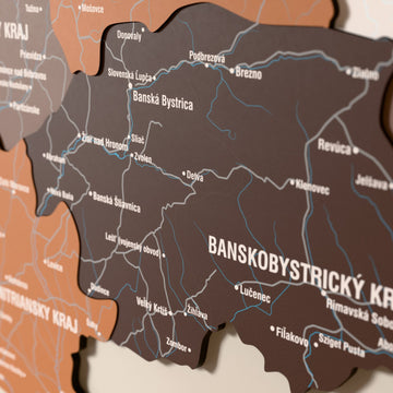 Close-up of the Soil Slovakia wooden wall map with layered regions and printed names
