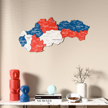 Flag colored Slovakia wooden wall map above a marble console, front view