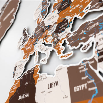 Close-up of Europe and the Mediterranean on the Soil metal world map with Libya and Egypt in brown and white