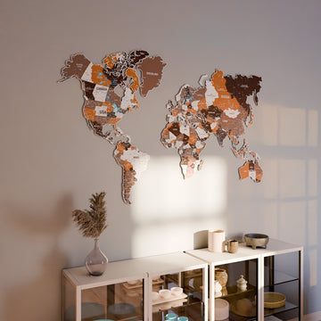 Soil metal world map on a warm gray wall above a glass-front shelf unit with sunlight and shadows