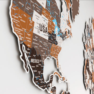 Side-angle close-up of North America on the Soil metal world map with USA, Mexico and state names