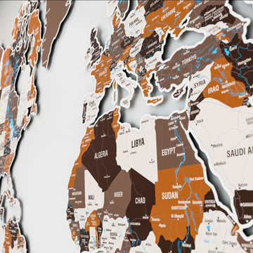 Close-up of North Africa and the Middle East on the Soil metal world map with Libya, Egypt and Sudan labels