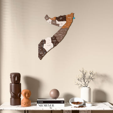 Soil Somalia wooden wall map above a marble console, front view
