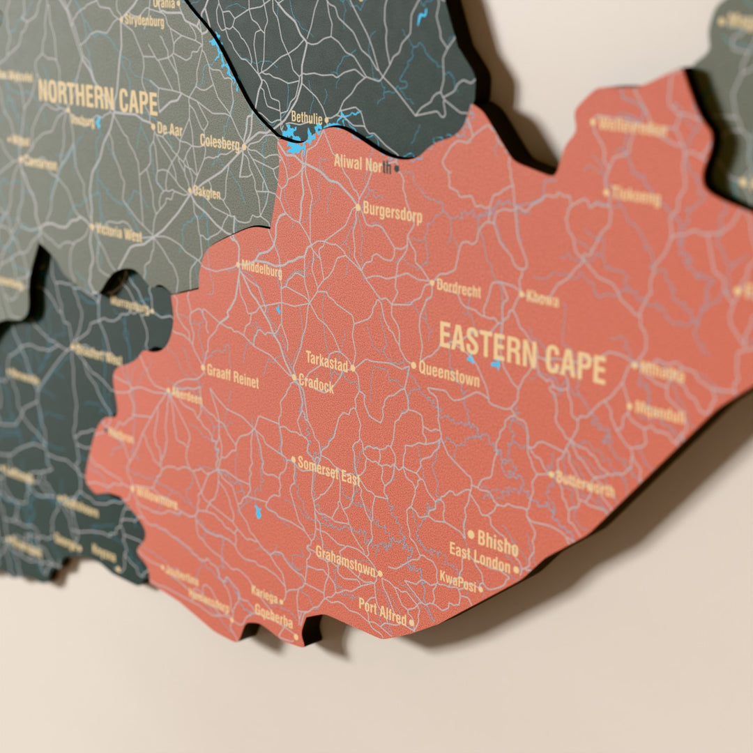 Close-up of the Sage South Africa wooden wall map with layered regions and printed names