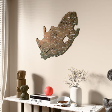 Satellite South Africa wooden wall map beside a sheer curtain, angled view