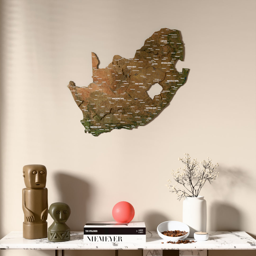 Satellite South Africa wooden wall map above a marble console, front view