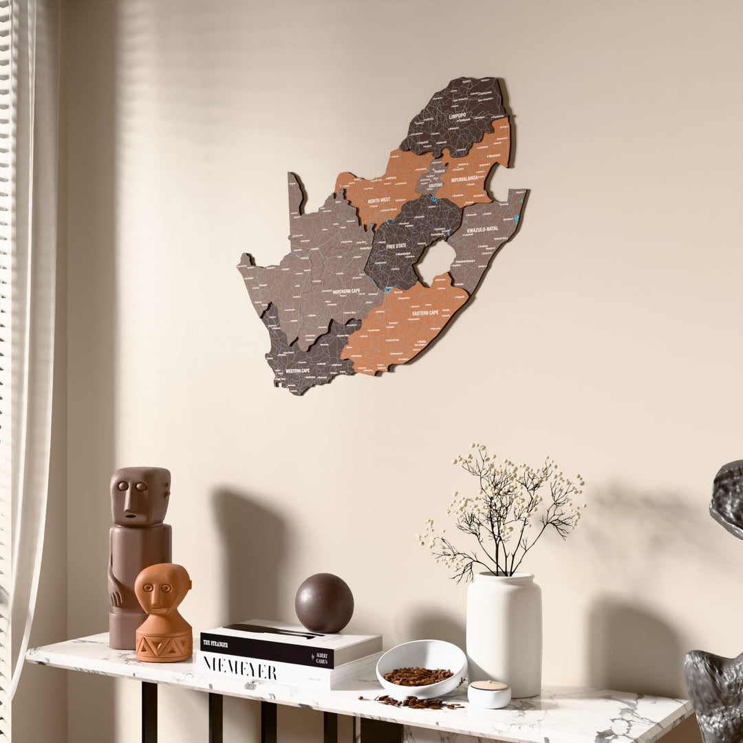 Soil South Africa wooden wall map beside a sheer curtain, angled view