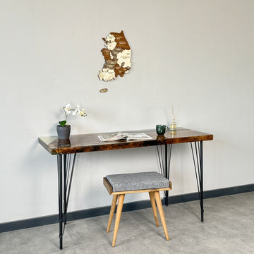 South Korea wooden wall map above a desk with a reed diffuser