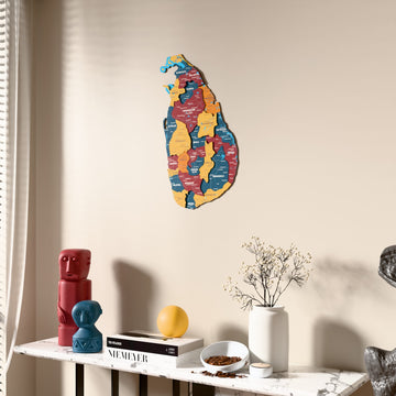 Flag colored Sri Lanka wooden wall map beside a sheer curtain, angled view
